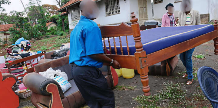 residents take part of their belongings following an eviction